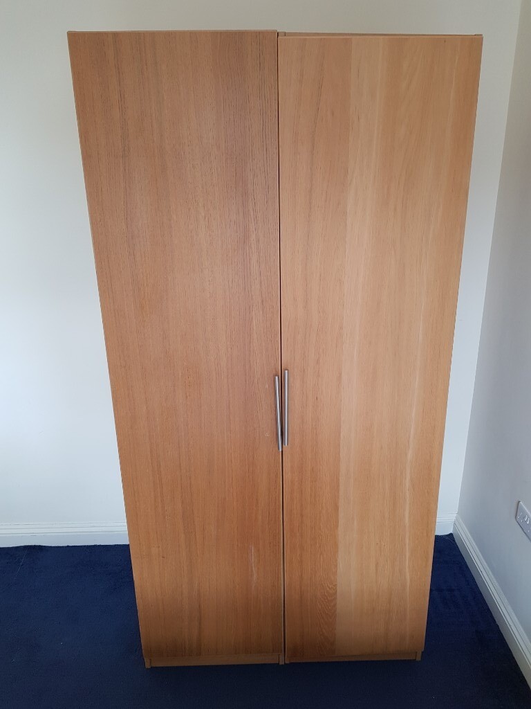 2 X Ikea Pax Wardrobes Including Rails Shelves And Mesh Baskets