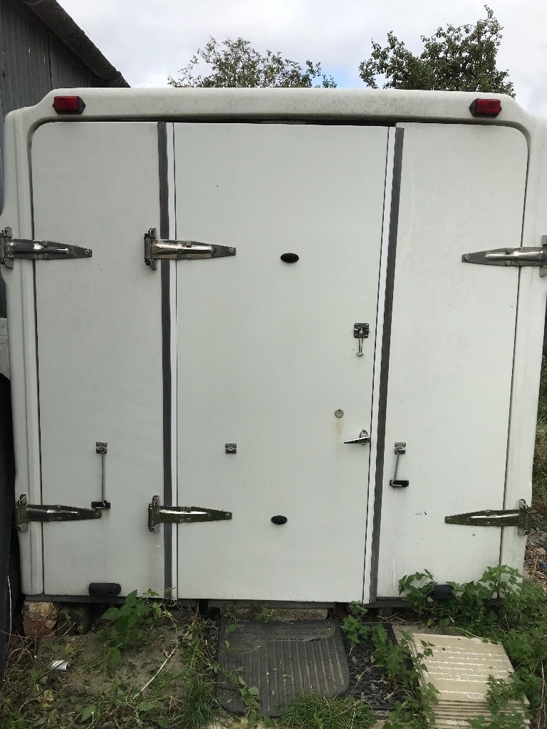 Luton van back. Kitted out with shelves,storage,little cooker