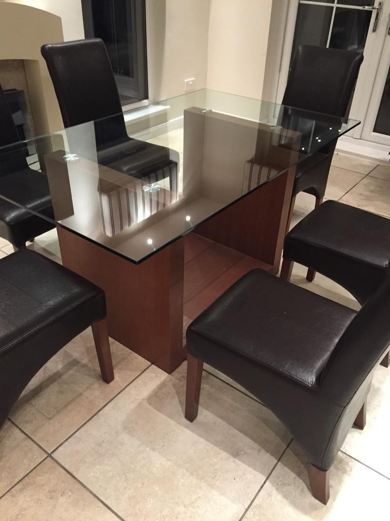 Stunning glass dining table and leather chairs in Lanark, South