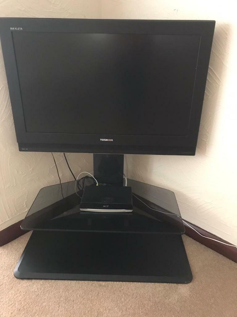 Tv, toshiba 32 inch, tv stand and BT free view box in Woodley
