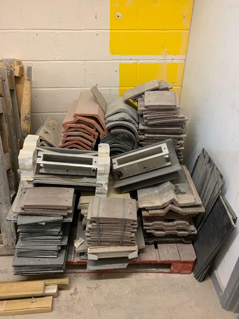 Pallet full of assorted roofing tiles ridge tiles and slate in