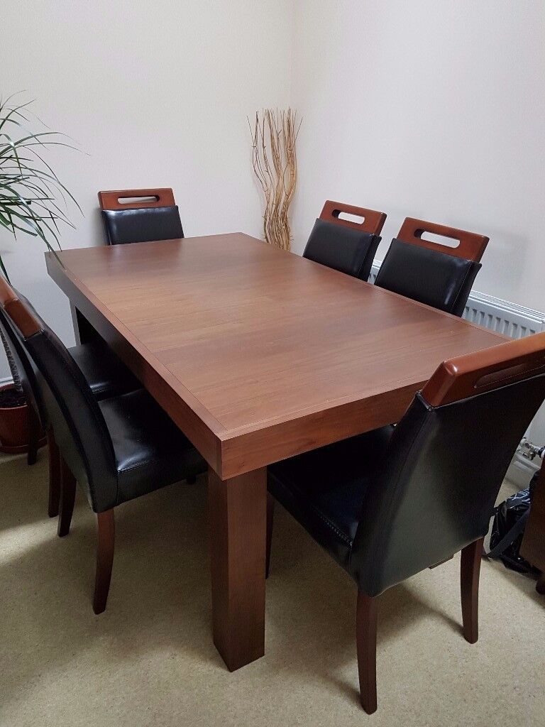 Akita Walnut 6 8 Seater Extending Dining Table In Yeovil in Dining Tables Yeovil