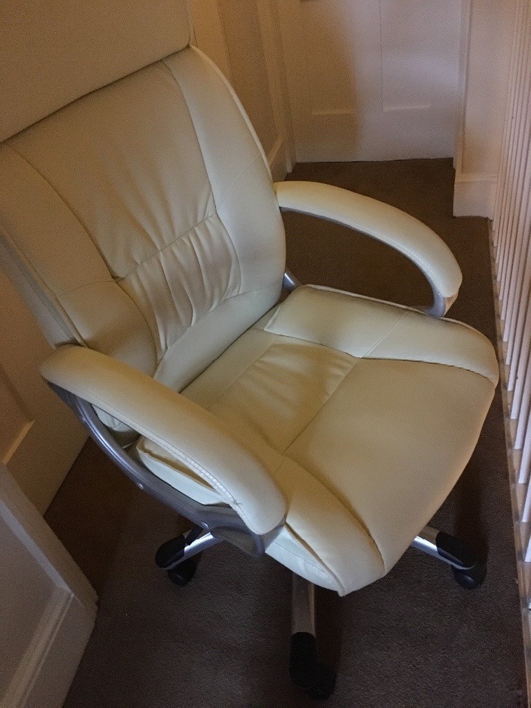 Cream leather desk chair. Beautifully comfortable and adjustable chair