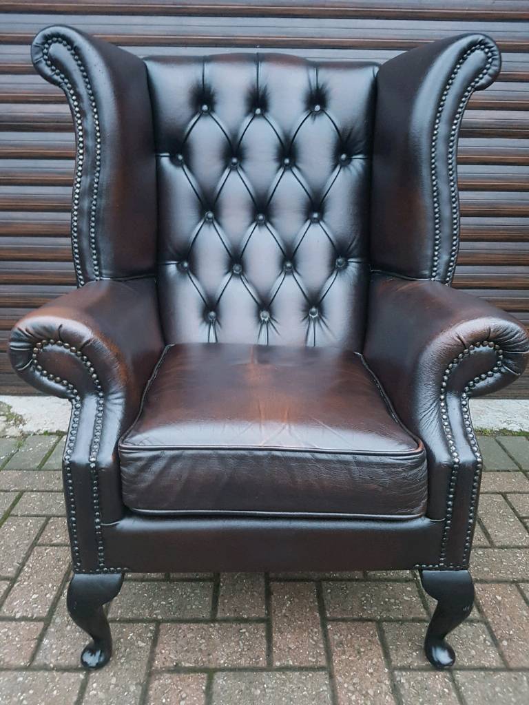 Chesterfield genuine Antique brown leather queen Anne wingback chair