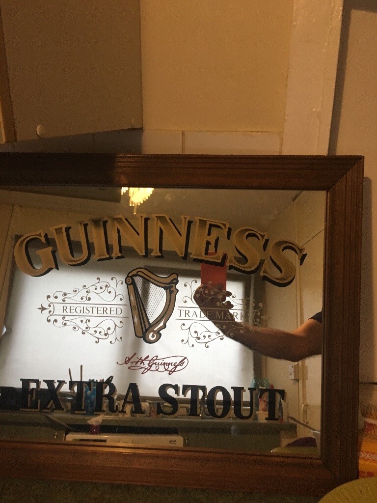 Pub mirrors and Guinness print in Charing Cross, Glasgow Gumtree