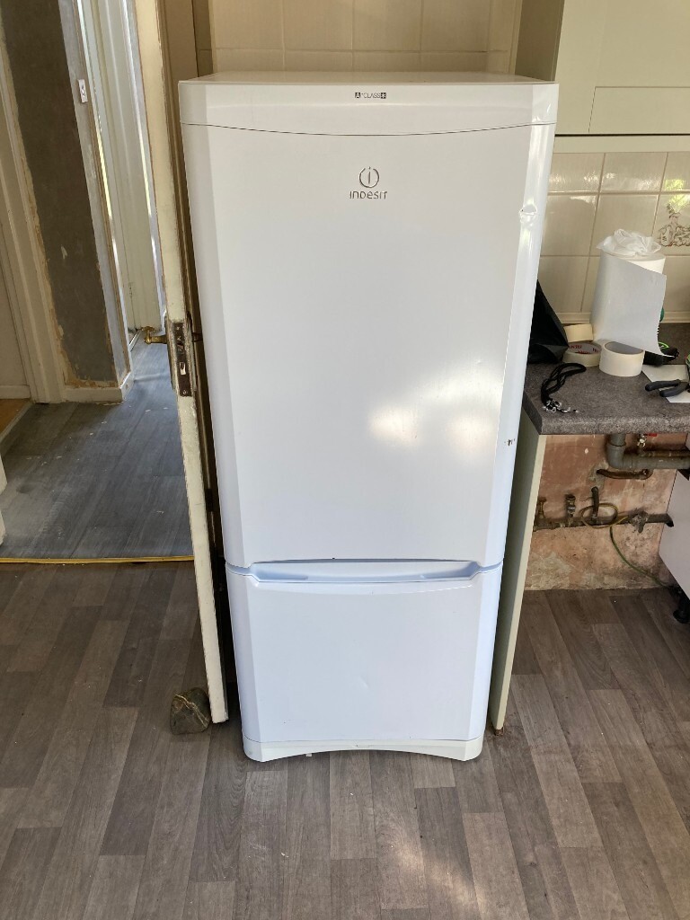Indesit white fridge freezer, 150cm by 60cm in Andersonstown, Belfast