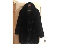 New black size M women’s faux fur coat