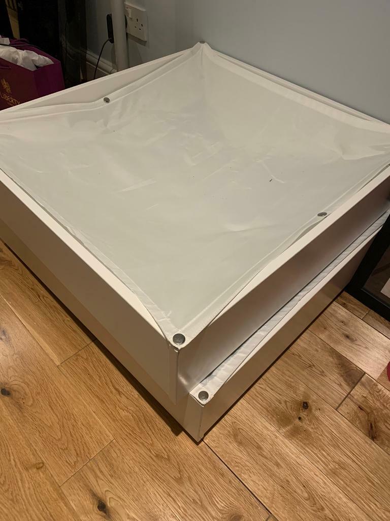 2x wooden under bed storage boxes on wheels in Earls Court, London
