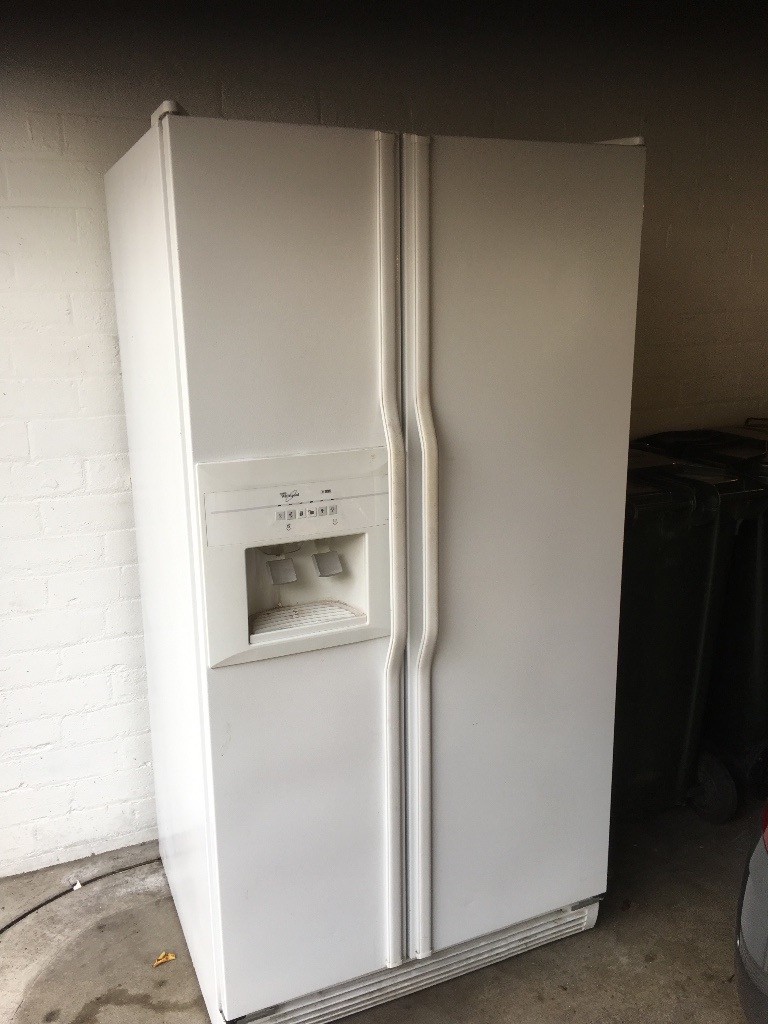 Whirlpool American Style Fridge Freezer with ice maker and cold water dispenser in Stockbridge