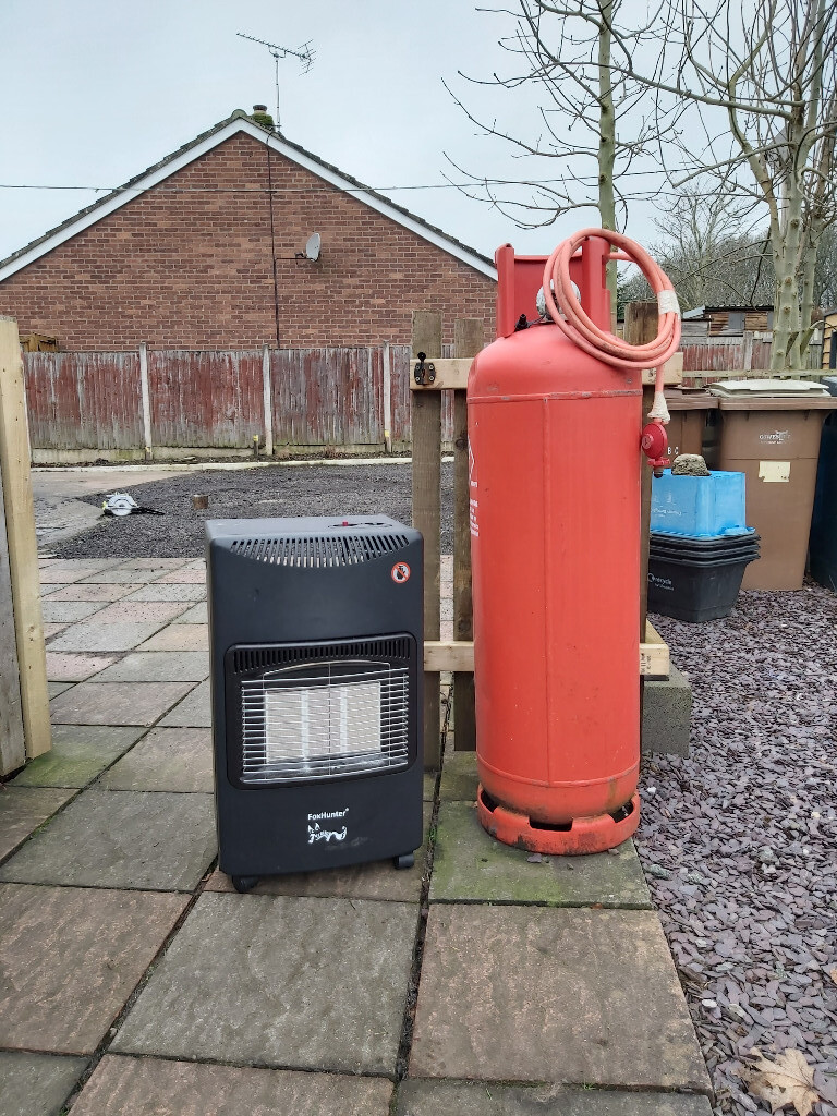 gas heater with near full gas bottle in Oswestry, Shropshire Gumtree
