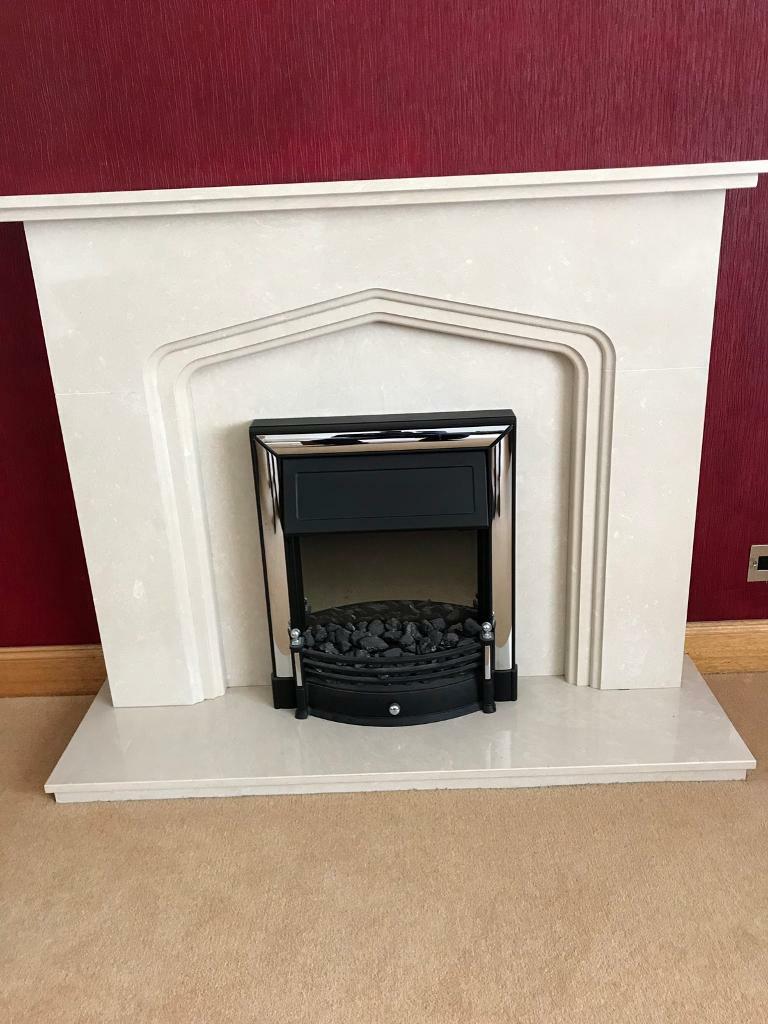 Modern Marble fireplace with electric fire. in Whitburn, West Lothian