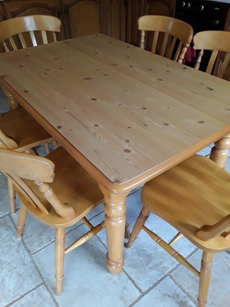 Kitchen table with heat resistant surface and 6 chairs in Portadown