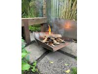 Fire pit from heavy reclaimed steel ideal for evenings in the garden 