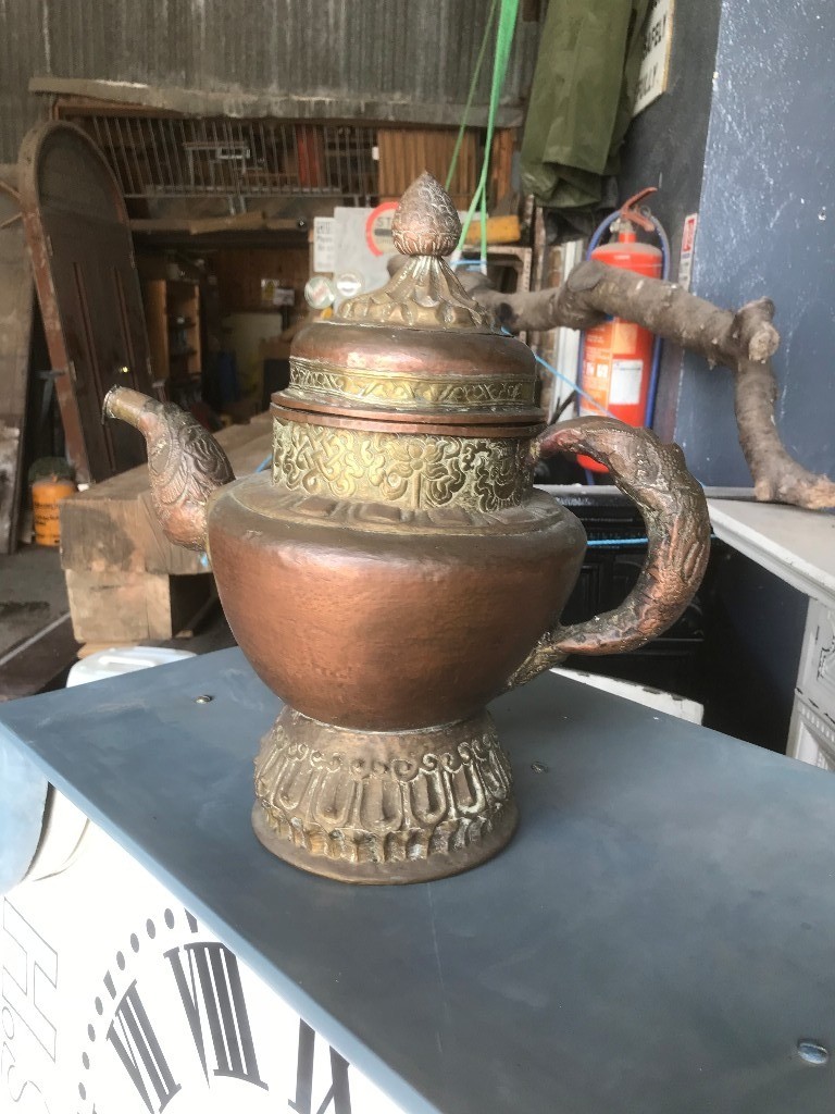 Ancient brass bronze coated tea pot in Castlerock, County Londonderry