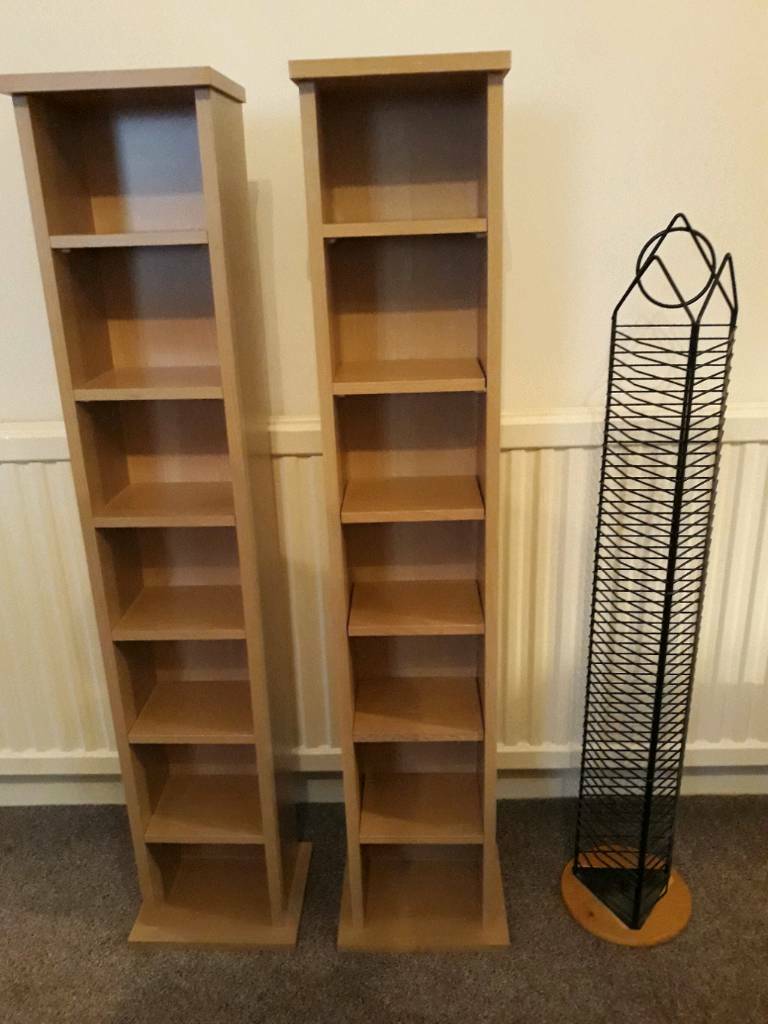 2 x free standing wooden CD towers with removable shelves in