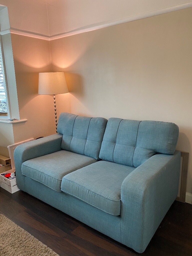 Light blue sofa couch and arm chair in great condition. Hardly used