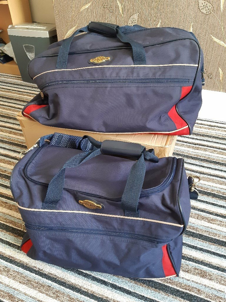 Matching Holdalls ( Revelation ) Navy and Red in Porthcawl, Bridgend