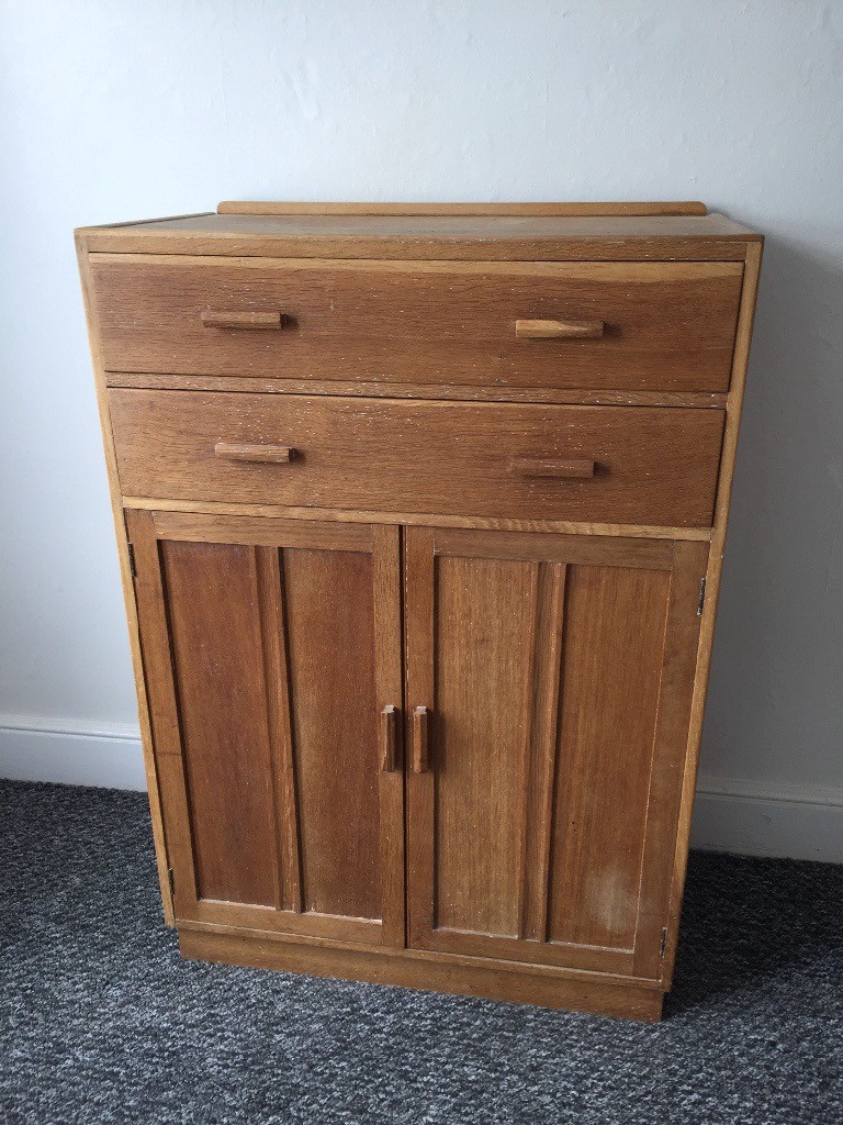 Stripped oak tall boy cupboard with drawers in Milford on Sea