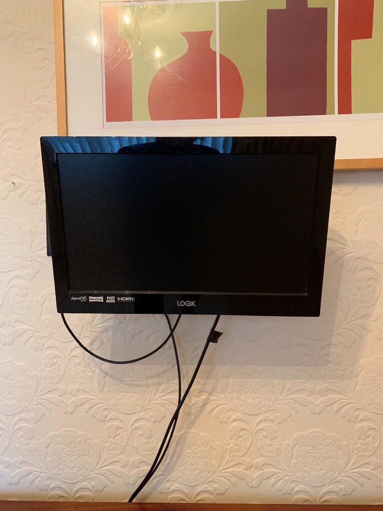 LOGIK 21” TELEVISION WITH ADJUSTABLE WALL STAND AND REMOTE in Lisburn