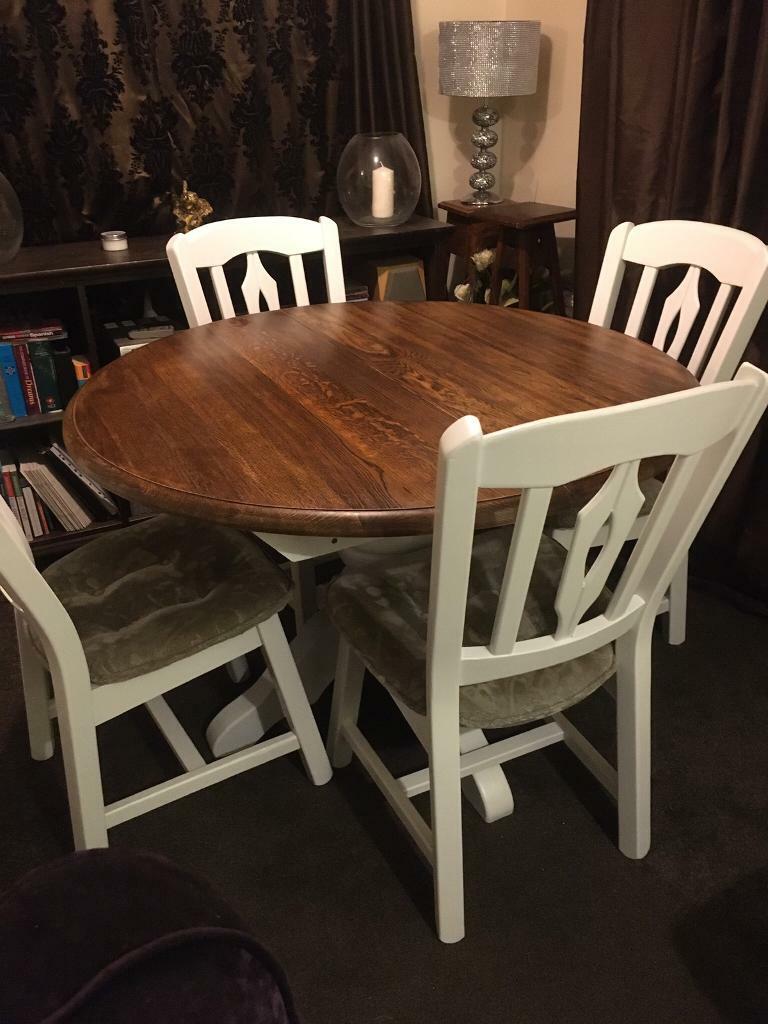 solid oak dining table with 4 chairs