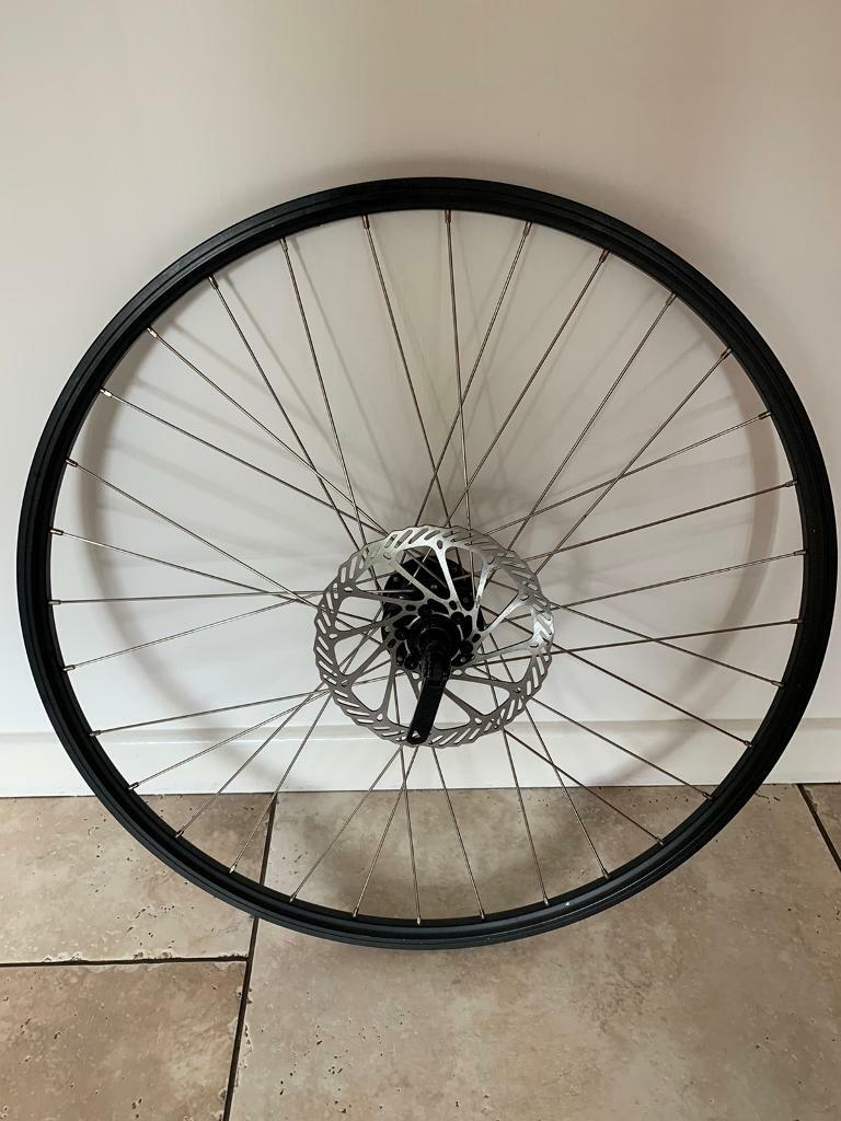 Road bike disc brake wheel with 160mm disc, 10 speed hub and skewer