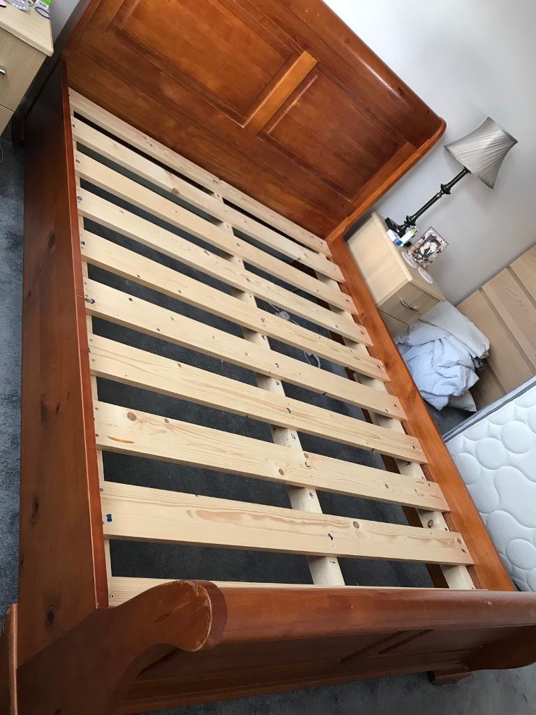 King size wooden slay bed and sealy mattress can be sold separately