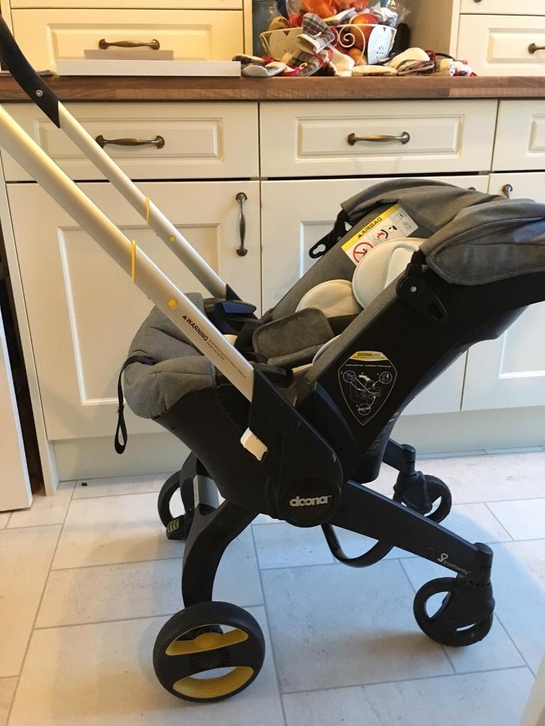 Doona Pram Car Seat with Isofix and Rain Cover in Lostock Hall