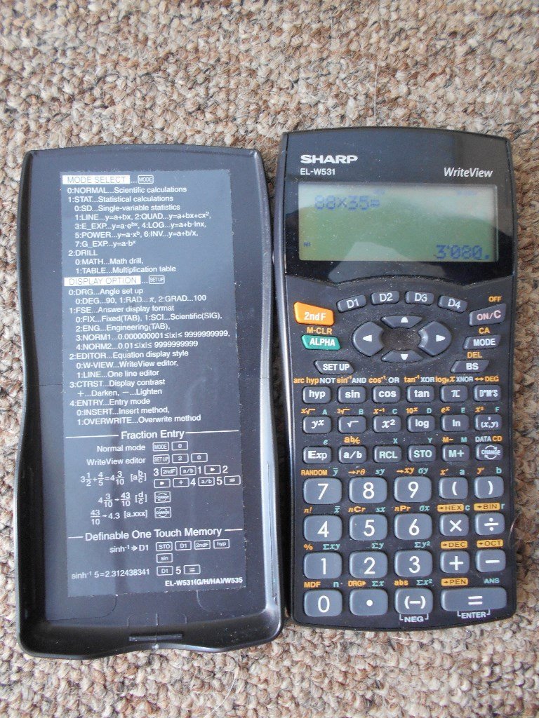 2 Scientific Calculators Sharp ELW531 and Casio fx83ES in Hedge