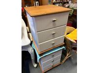 Pair of white bedside cabinets with wood tops