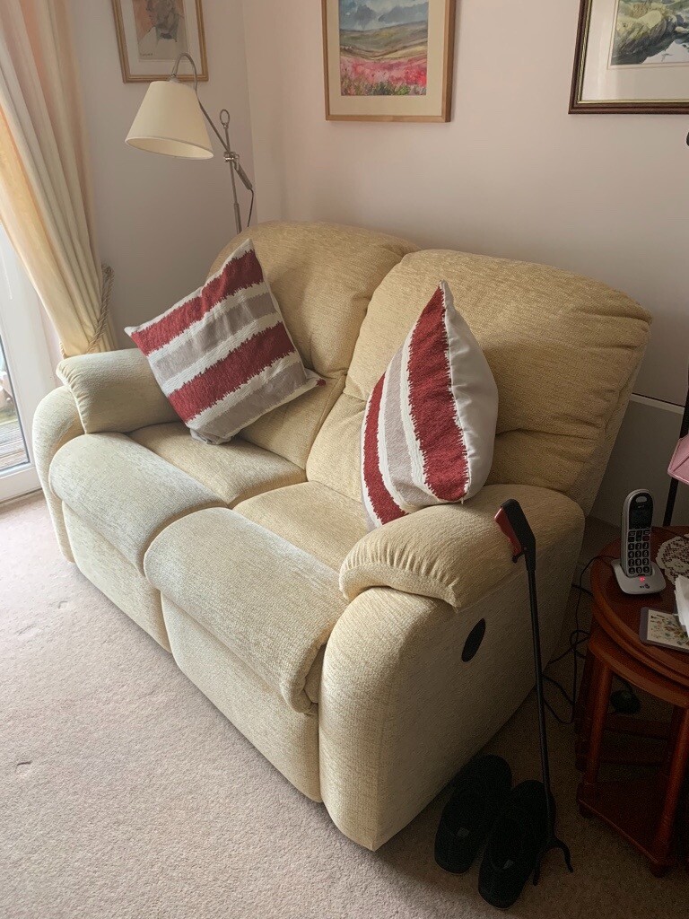 Reclining two seater Sofa yellow excellent condition in Stokeon