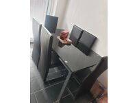 Black Glass Dining table with 6 Leather Chairs 