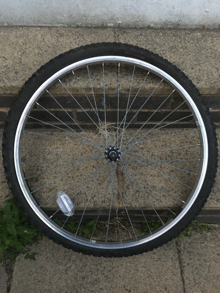 Front mountain bike wheel 26 inch (almost new)+ used tyre (no tube