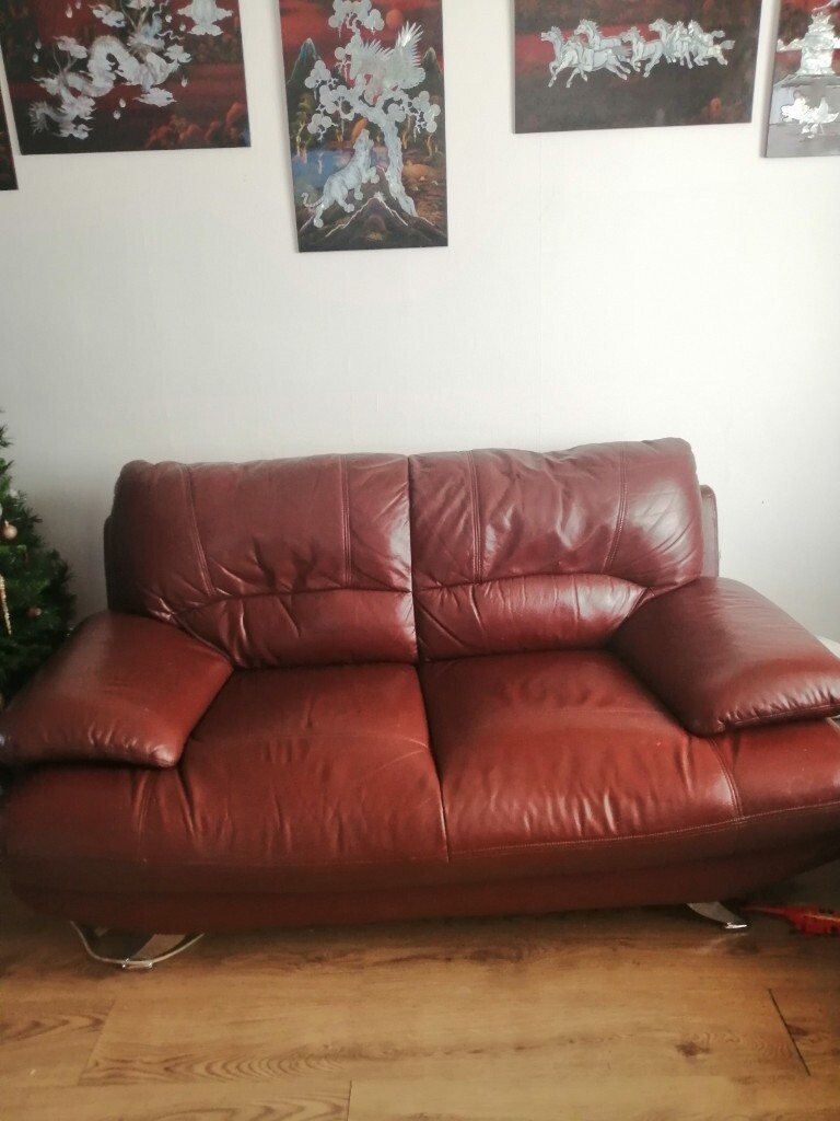 Red leather 2 and 3 seater sofa with chrome legs in Whitchurch