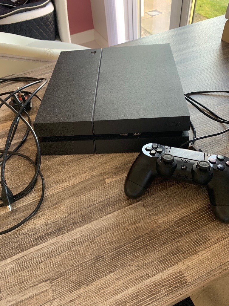 Sony PS4 model CUH1216A barely used perfect condition with wireless controller 500GB in