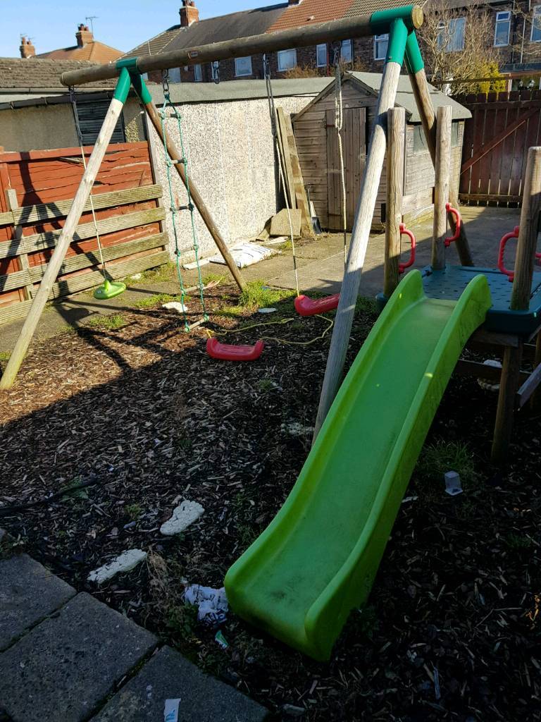 Treated wood climbing frame comes with 3 swings and a ladder and a