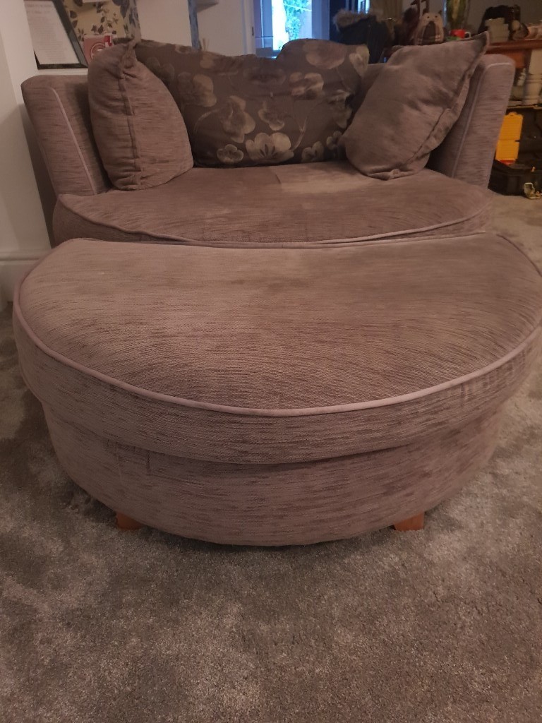 Used grey swivel chair and foot rest in Kirkham, Lancashire Gumtree