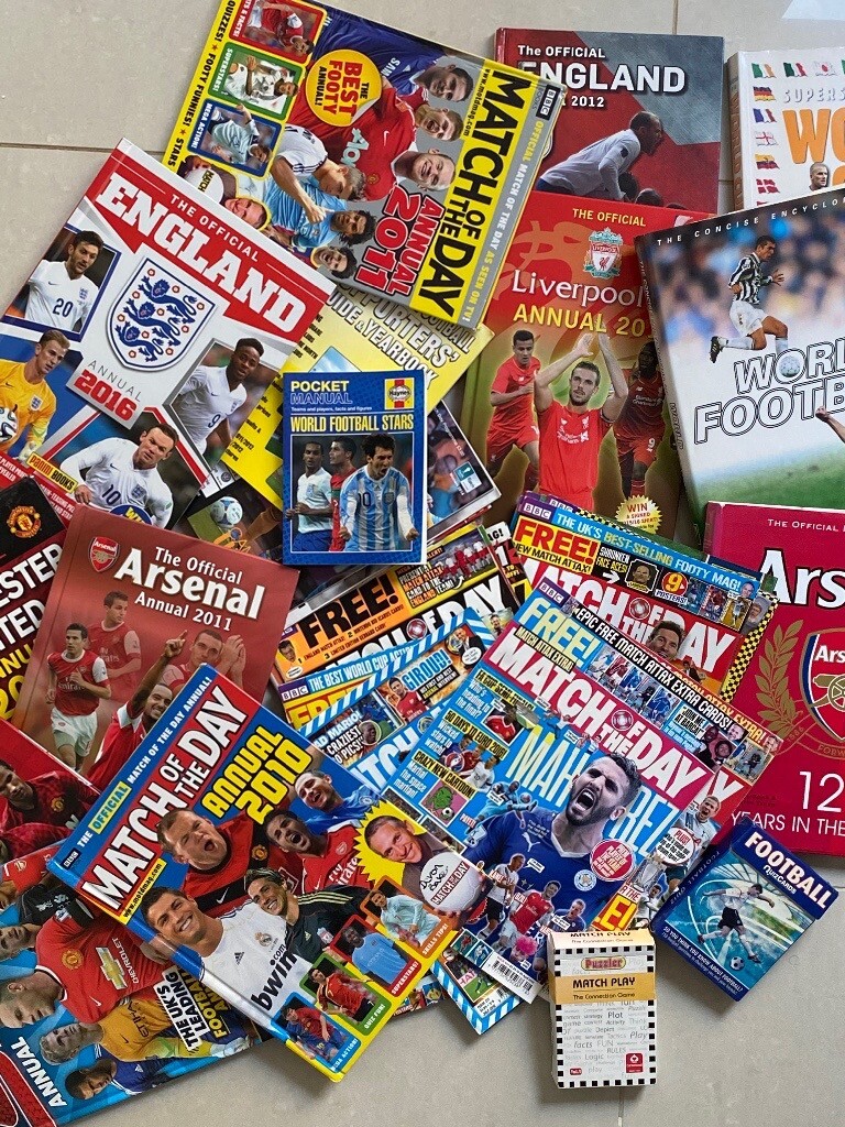 Collection of football annuals and magazines in Cambridge