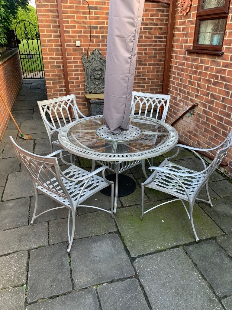 Unusual solid aluminium garden table and 4 chairs in Nottingham