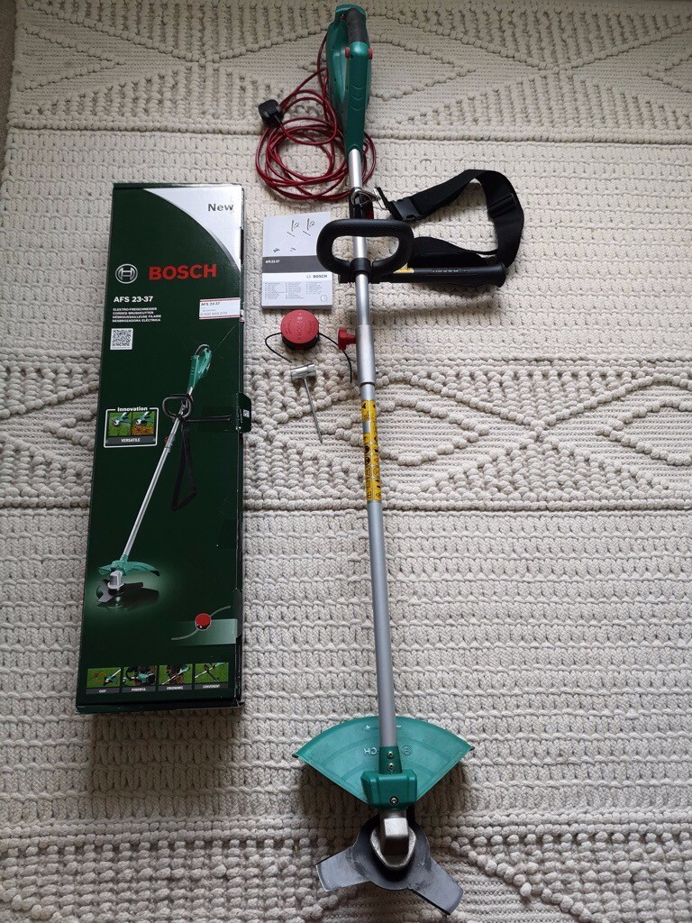 Bosch Strimmer. AFS 2337. Corded interchangeable 3 prong metal blade