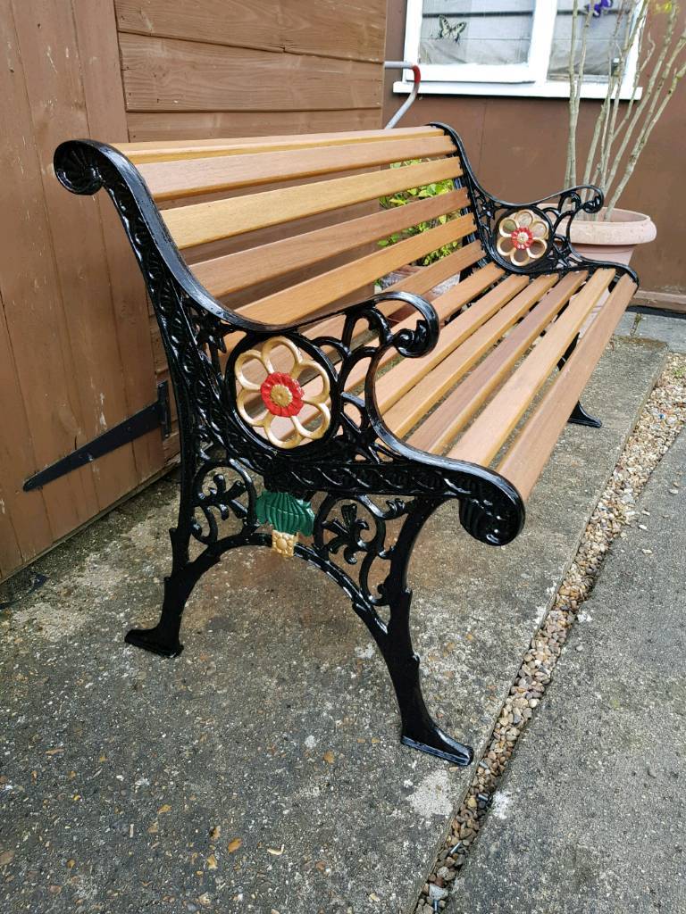 REFURBISHED VINTAGE CAST IRON AND HARDWOOD GARDEN BENCH. in Ashford