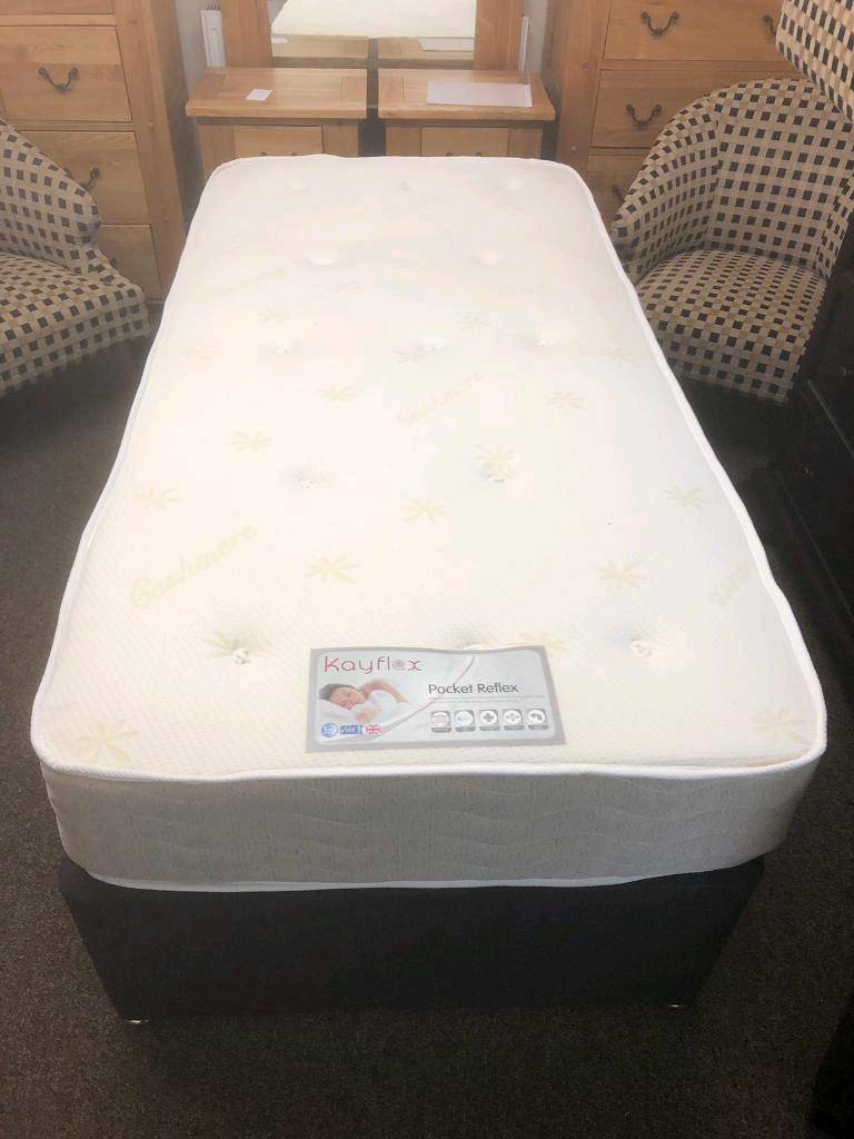 Benson's single base bed with mattress and storage in good condition