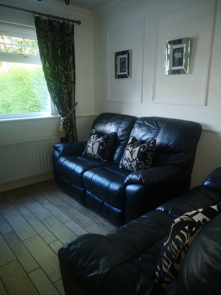 Black Leather Reclining Sofa Bespoke Curtains And Matching Pillows