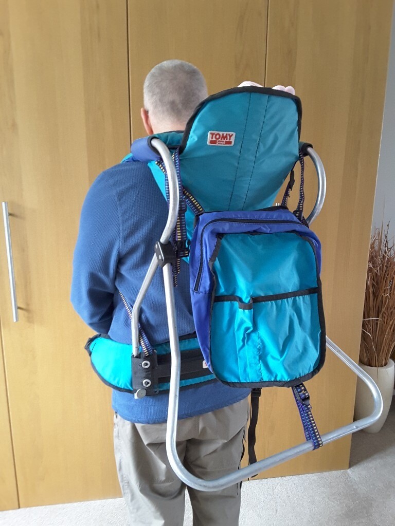 Tomy backpack style baby carrier with detachable rucksack for babys