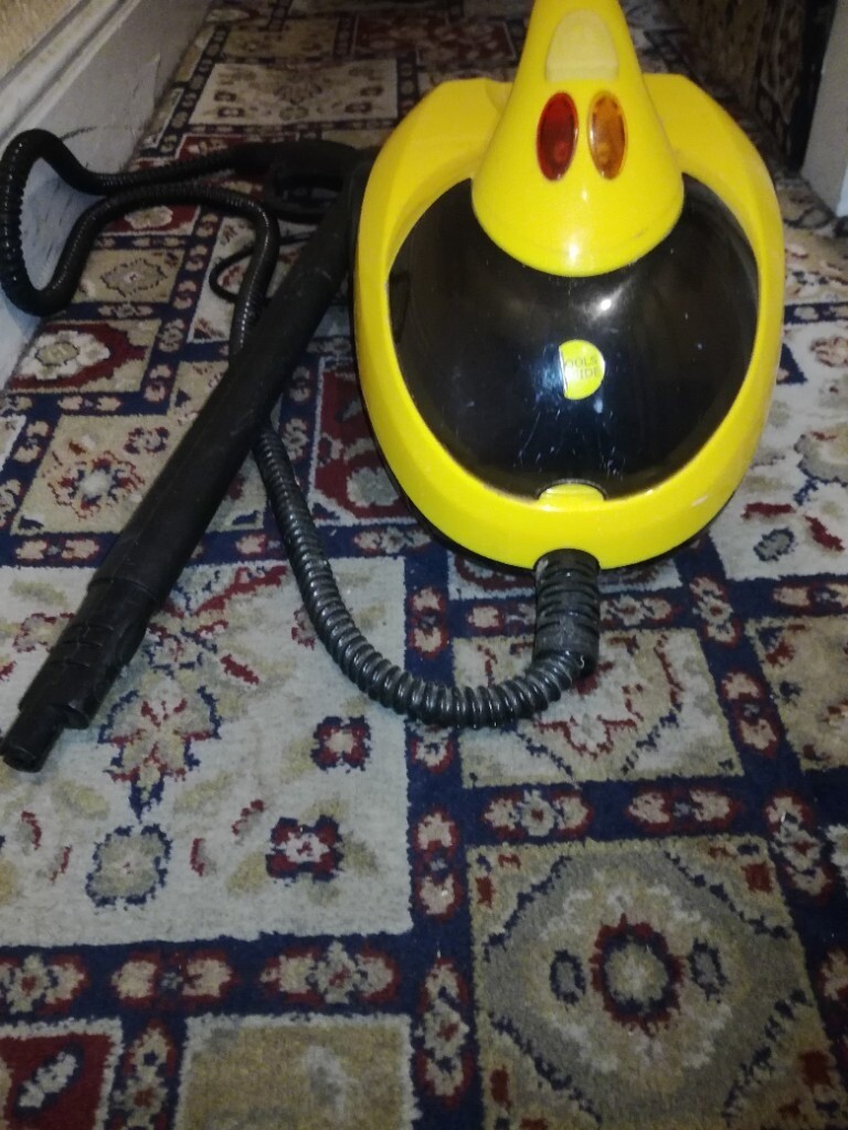 LITTLE YELLOW STEAM CLEANER WITH ACCESSORIES USED GREAT CONDITION
