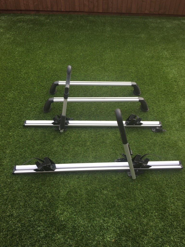 Suzuki Swift roof bars and bike carriers as new .Great for transporting mountain bikes in