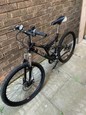Men’s Raleigh mountain bike with good suspension (medium)
