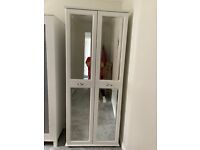 White wardrobe with glass front 