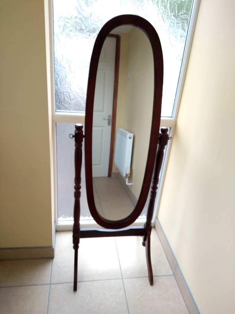 Free standing dark wood mirror. in Poole, Dorset Gumtree