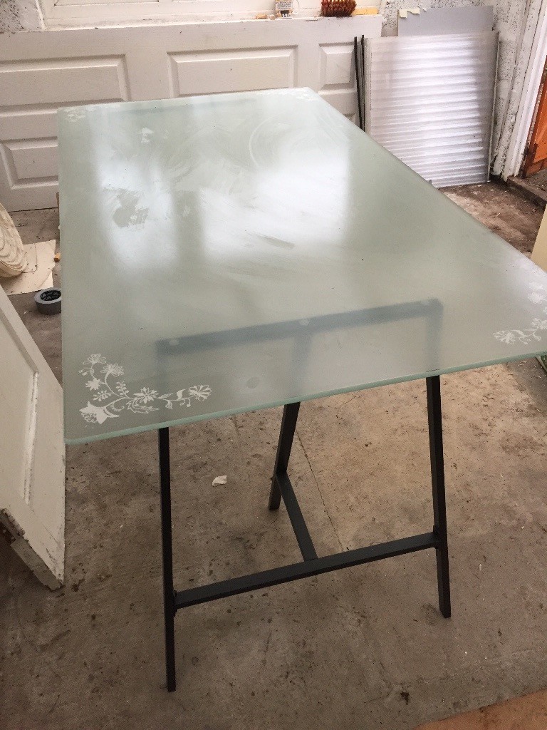 IKEA glass table top and black metal trestle legs in Frenchay