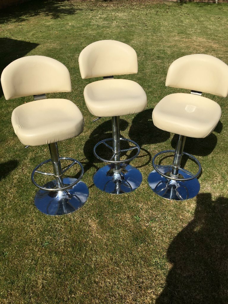 Cream kitchen bar stools gas lift and swivel. Purchased from